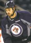 KEN GIGLIOTTI /  WINNIPEG FREE PRESS archives
Defenceman Zach Bogosian could miss three months of the season, if there is one.