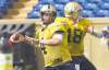 KEN GIGLIOTTI  / WINNIPEG FREE PRESS
Injured Bombers quarterback Buck Pierce (left) chucks balls with third-string QB Justin Goltz during a practice at Canad Inns Stadium on Wednesday.