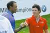 CP
Charles Rex Arbogast / the associated pressTiger Woods (left) and Rory McIlroy after completing Thursday�s first round.