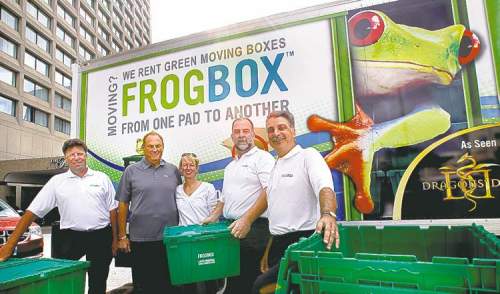 WAYNE GLOWACKI / WINNIPEG FREE PRESS FILE PHOTO
Jim Treliving (in dark shirt) meets with local Frogbox operators. Frogbox is one of the companies he has a stake in as a Dragon.