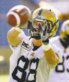 JOE BRYKSA / WINNIPEG FREE PRESS
Blue Bombers receiver Jade Etienne prepares to squeeze a pass at practice Wednesday.
