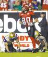 Jeff McIntosh / the canadian press
Winnipeg's Johnny Sears (right) and Ian Logan are beaten for a TD reception by Calgary Stampeder receiver Johnny Forzani on Friday night.