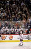 TREVOR HAGAN / WINNIPEG FREE PRESSThe fans at MTS Centre cheer as a video tribute is played for Chicago Blackhawks' Andrew Ladd (16), right, as he visits for the first time after being traded away by the Winnipeg Jets' during first period NHL hockey action, Friday, March 18, 2016.