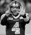 FULL CLOSE CUT CLOSECUT - Winnipeg Blue Bombers QB Buck Pierce signals bench during forth quarter play against the  Hamilton Tiger-Cats during CFL action in Winnipeg Friday night �� Winnipeg won over Hamilton 34-12- See Paul Wiecek story�� September 21, 2012   (JOE BRYKSA / WINNIPEG FREE PRESS)