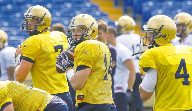 KEN GIGLIOTTI / WINNIPEG FREE PRESS archives
Quarterbacks Alex Brink, Joey Elliott and Buck Pierce (from left) have had varying degrees of success under centre.