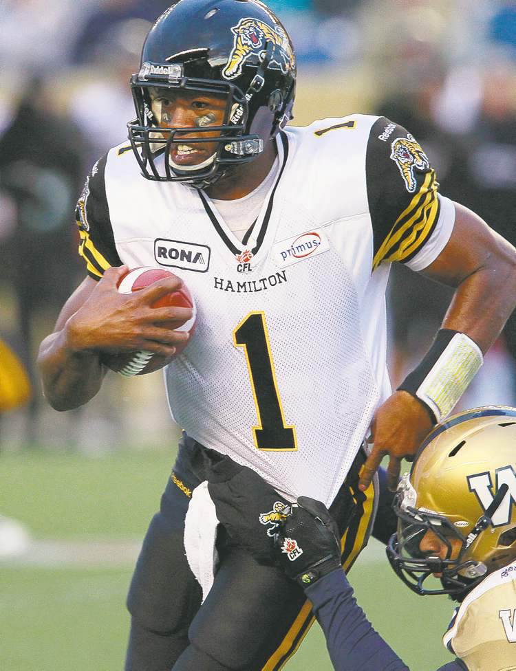 John Woods / THE CANADIAN PRESS ARCHIVES
Tiger-Cats QB Henry Burris can be awesome or awful, depending on the day of the week. The Bombers are hoping for the bad Burris today.