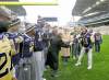 Bomber Hall of Famer Kenny Ploen shakes Mayor Sam Katz's hand as dignitaries, Bombers and former Bombers check out Investors Group Field Monday.