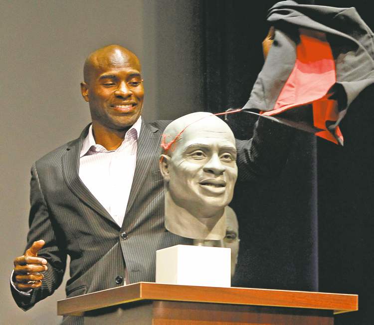 WAYNE GLOWACKI / WINNIPEG FREE PRESS
The one and only Milt Stegall unveils his bust at a Canadian Football Hall of Fame ceremony Friday. Milt would have preferred a statue, but...