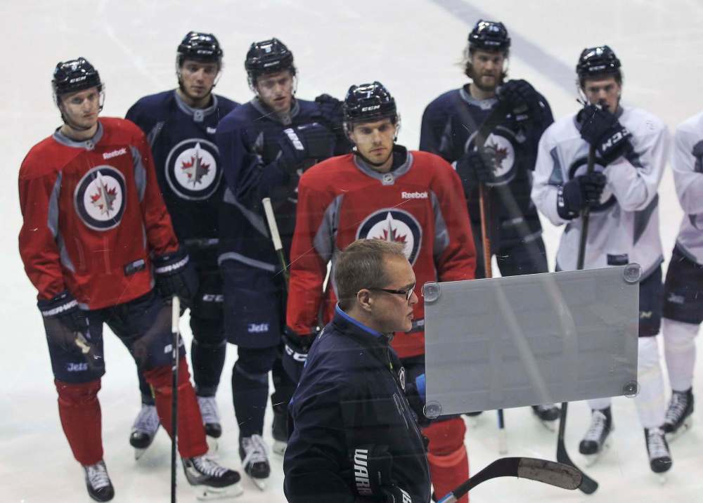 MIKE DEAL / WINNIPEG FREE PRESS
There were just 13 skaters and goaltenders Ondrej Pavelec and Michael Hutchinson on the ice this morning as the Jets prepared for their game against the Canucks.