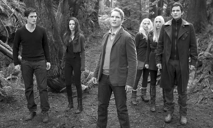 CP
This film image released by Summit Entertainment shows, from left, Robert Pattinson, Kristen Stewart, Peter Facinelli, MyAnna Buring, Casey LaBow and Christian Camargo in a scene from