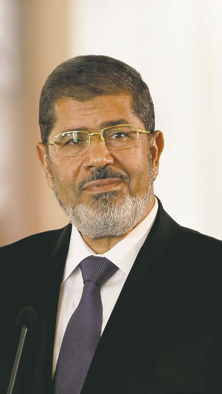CP
Maya Alleruzzo / The Associated Press Archives
Egyptian President Mohammed Morsi put himself above oversight.