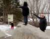 BORIS MINKEVICH / WINNIPEG FREE PRESS
NDP Leader Greg Selinger, right, plays 'explorer' with Adam and his sister, Violet Stewart-Boulay, left.