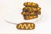 Chocolate coffee fingers, a homemade treat, join a selection of bakery cookies to help put the yum in yule.