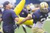 JOE BRYKSA / WINNIPEG FREE PRESS archivesCasey Creehan, then linebackers coach, works out Bombers� Jason Vega at practice in 2011.