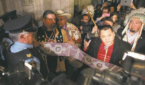 CP
First Nations leaders talk to the media outside the House of Commons Tuesday.