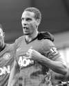 CP
Clint Hughes / The Associated PressManchester United�s Rio Ferdinand walks off the pitch after being hit in the face by a coin thrown from the crowd Sunday. Nine men were charged in connection with the derby disorder Monday.