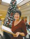 Boris Minkevich / Winnipeg Free Press
Pam Bolton, a Hospice and Palliative Care Manitoba volunteer, helps out at the organization's memory tree in St. Vital Centre. People can affix a card to the tree in memory of a loved one who has died.



















volunteers for Hospice and Palliative Care Manitoba in many different roles. She will be helping out at the HPCM Memory Tree this Thurs Dec 13th at the St. Vital Mall from 9:30 am to noon. Here she poses for a photo in front of the tree. The Hospice Memory Tree is a special place to help ease the pain of grief during the holiday season and where you are invited to hang a card of remembrance for your loved one who has died. The tree offers a very meaningful and symbolic way to remember loved ones over the holiday season. This service to the community is provided at no cost to anyone wishing to honour the memory of their loved one. Specially trained volunteers from Hospice & Palliative Care Manitoba are on hand at the Tree to offer support and information on bereavement services. December 13, 2012  BORIS MINKEVICH / WINNIPEG FREE PRESS