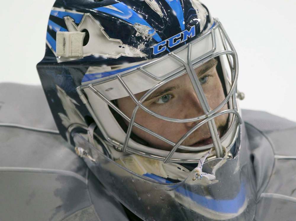 JOE BRYKSA / WINNIPEG FREE PRESS
Eric Comrie has yet to see action in the bigs but he leads the AHL in saves and has played more minutes than any rookie goalie.