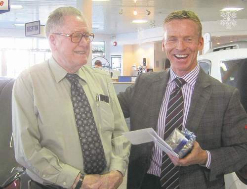 Bob McKee with Murray Chev president Dan Murray at McKee's retirement  reception.