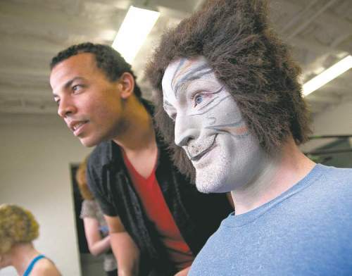 HADAS PARUSH / WINNIPEG FREE PRESS ARCHIVESHogg (left) with Carson Nattrass during rehearsals for Cats at Rainbow Stage in June 2011.