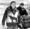 WAYNE GLOWACKI / WINNIPEG Free PressCross Lake First Nation elder Raymond Robinson (left) and his son, Baptiste, at Richardson International Airport prior to their flight to Ottawa on Monday.