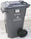 KEN GIGLIOTTI / WINNIPEG FREE PRESS / Jan 11 2010- 100111 - City of Winnipeg Automated Garbage Cart Bins Autobin are being distributed  through out the city starting  today (monday) , 400 bins are being dropped on Foxwarren Dr. in pic with   bar coded  bin close cut closecut