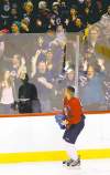 John Woods / The Canadian Press
Winnipeg Jets forward Evander Kane throws hats to fans on opening day of training camp at the MTS Centre on Sunday.