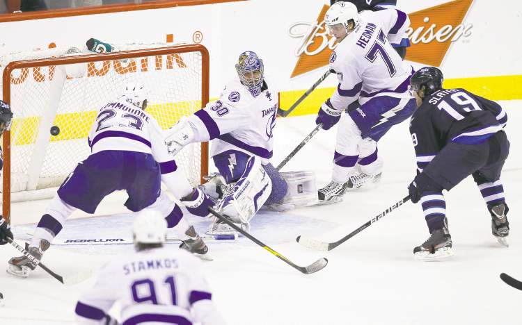 Winnipeg Free Press archives
Winnipeg Jets� Jim Slater (19) scores late in the third period against Tampa Bay Lightning�s goaltender Dwayne Roloson (30) during NHL action at MTS Centre in Winnipeg, April 7, 2012. (TREVOR HAGAN/WINNIPEG FREE PRESS)