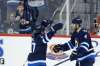 John Woods
/ The Canadian Press
Winnipeg Jets' Nikolaj Ehlers (27) and Paul Postma (4) celebrate Postma's goal against the Los Angeles Kings during third period NHL action in Winnipeg on Thursday, March 24, 2016.