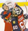 Tribune Media MCT
Joe Rimkus Jr. / Miami Herald / MCT
Florida Panthers goalie Jose Theodore gives teammate Jonathan Huberdeau a friendly mugging following a 5-1 victory over the Carolina Hurricanes.