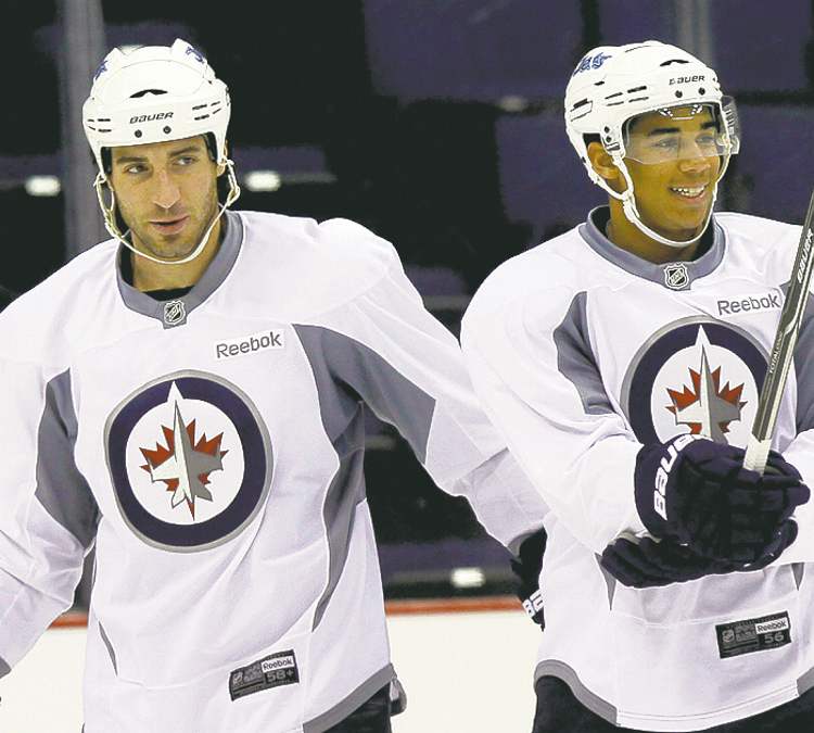 Winnipeg Free Press
Chris Thorburn and Evander Kane. The Winnipeg Jets practice at Nationwide Arena in Columbus, Ohio. Sept. 20, 2011 (BORIS MINKEVICH / WINNIPEG FREE PRESS)