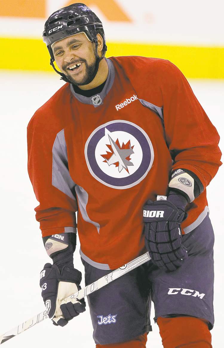 Dustin Byfuglien is among the league leaders in ice time early this season.