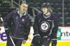 Mike Deal / Winnipeg Free Press
Winnipeg Jets head coach Claude Noel and Bryan Little share a laugh during Monday's practice before flying to Montreal to face the Habs tonight.