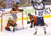 REUTERS
Jets' Chris Thorburn and Blake Wheeler celebrate a goal in a winning effort in Florida last April. While the Jets and Panthers split the series, the rivalry is neither easy nor natural.