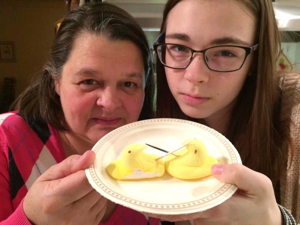 Doug Speirs / Winnipeg Free Press
Family ties were cast aside as Lena Cox (left) prepared her Peep knight to battle the fierce marshmallow warrior of her daughter, Linnea (right)