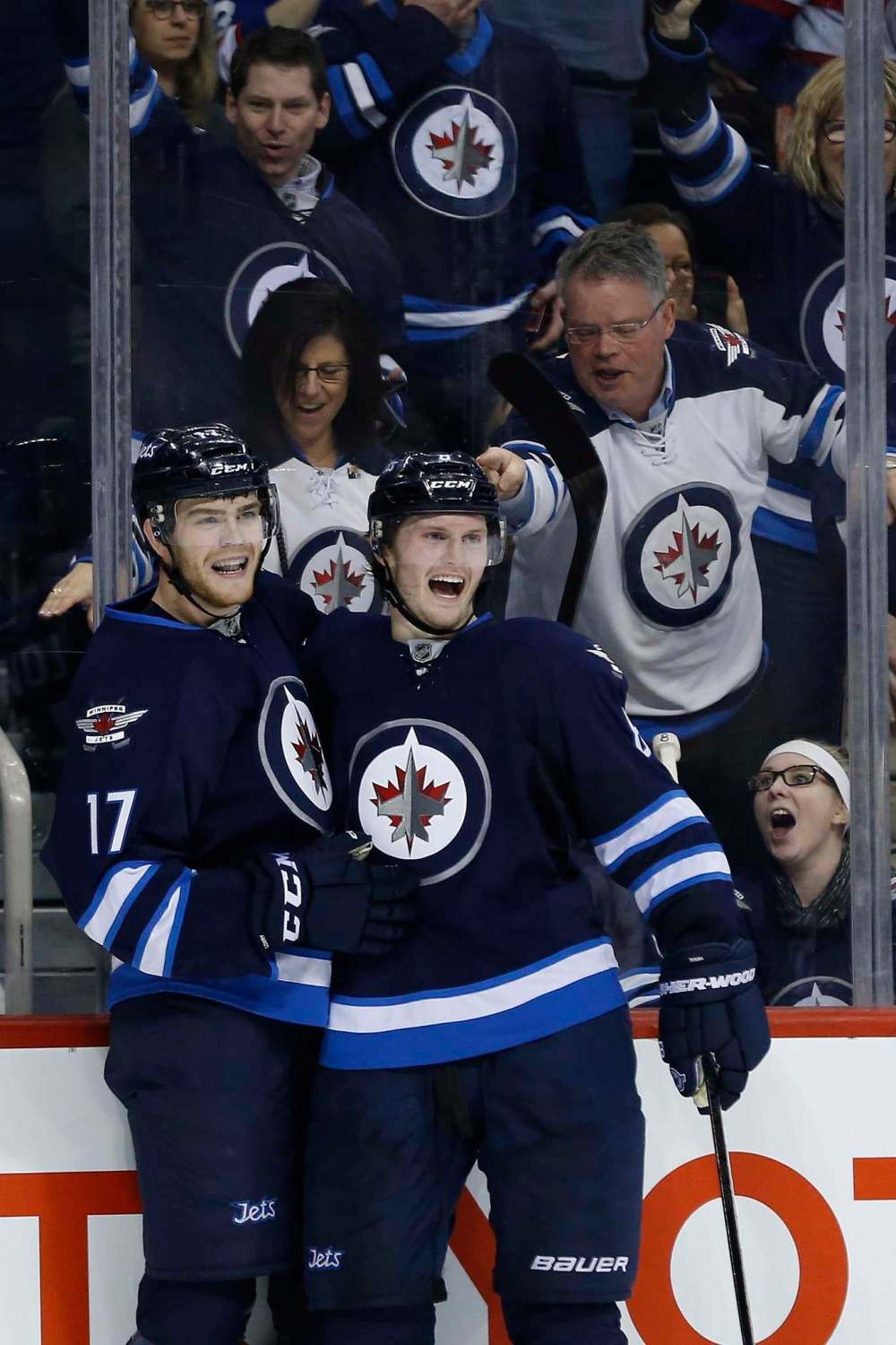 John Woods / The Canadian Press
Winnipeg Jets Adam Lowry (left) and Jacob Trouba celebrate Lowry’s goal against the Los Angeles Kings Thursday.