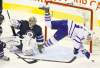 Trevor Hagan / Winnipeg Free Press archives
TREVOR HAGAN / WINNIPEG FREE PRESSToronto�s Clarke MacArthur (right) flies through the air after colliding with Jets goaltender Ondrej Pavelec during the second period Thursday.