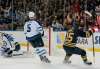 Gary Wiepert / The Associated Press
Winnipeg Jets' Michael Hutchinson (34) and Mark Stuart (5) react as Buffalo Sabres' Jack Eichel (15) celebrates his game-winning goal during the third period of an NHL hockey game, Saturday, March 26, 2016, in Buffalo, N.Y. Buffalo won 3-2.