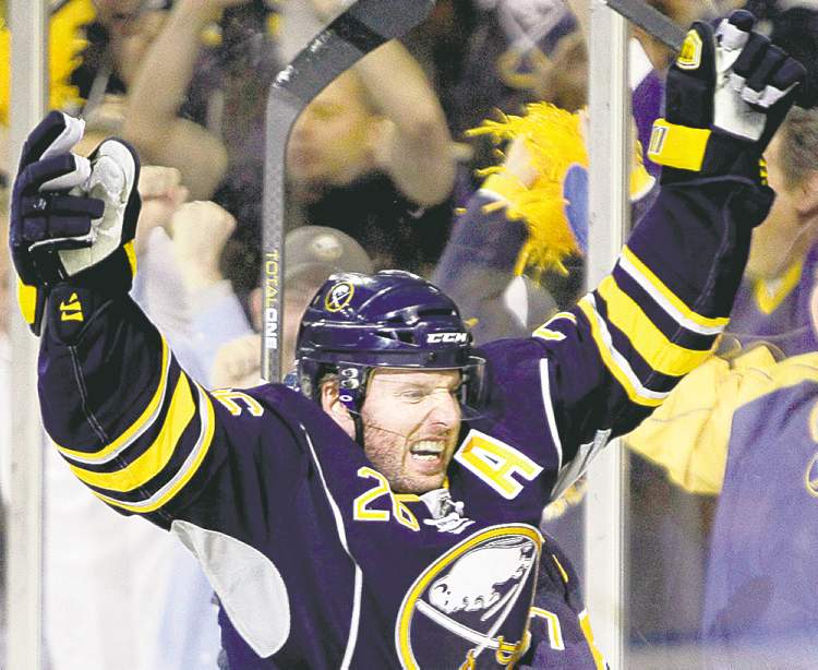 CP
FULL CLOSE CUT CLOSECUT - Buffalo Sabres' Thomas Vanek (26) of Austria, celebrates his goal against the Philadelphia Flyers during the first period in Game 6 of a first-round NHL Stanley Cup playoffs hockey series, in Buffalo, N.Y., Sunday, April 24, 2011. (AP Photo/David Duprey)