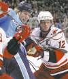 CP
Gene J. Puskar / the associated press archives
Jordan Staal (left) and brother Eric Staal went head to head when Jordan played in Pittsburgh. Now they centre Carolina�s first and second lines, respectively.