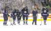 TREVOR HAGAN / WINNIPEG FREE PRESS
A whole passel of Jets are on hand to help as Blake Wheeler (third-left) limps off the ice after blocking a shot in the second period.