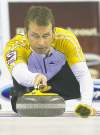 CP
Manitoba skip Jeff Stoughton throws his rock while playing against Ontario during final game action at the Brier Canadian Curling Championships in London, Ont., on Sunday, March 13, 2011.  THE CANADIAN PRESS/Nathan Denette