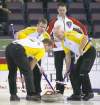 CP
Jonathan Hayward / the canadian pressNewfoundland skip Brad Gushue looks on as Manitoba skip Jeff Stoughton, second Reid Carruthers and third Jon Mead sweep their rock into the house Wednesday.