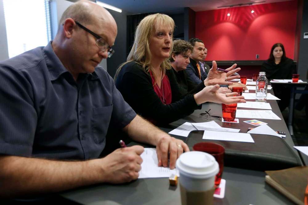 John Woods / Winnipeg Free Press
Shandi Strong (Liberal, Wolseley) speaks as (from left) Kurt Berger (Liberal, Elmwood), Barb Burkowski (NDP, Transcona), Wab Kinew (NDP, Fort Rouge) and Shannon Martin (PC, Morris) listen at a Pride Winnipeg meeting Monday.