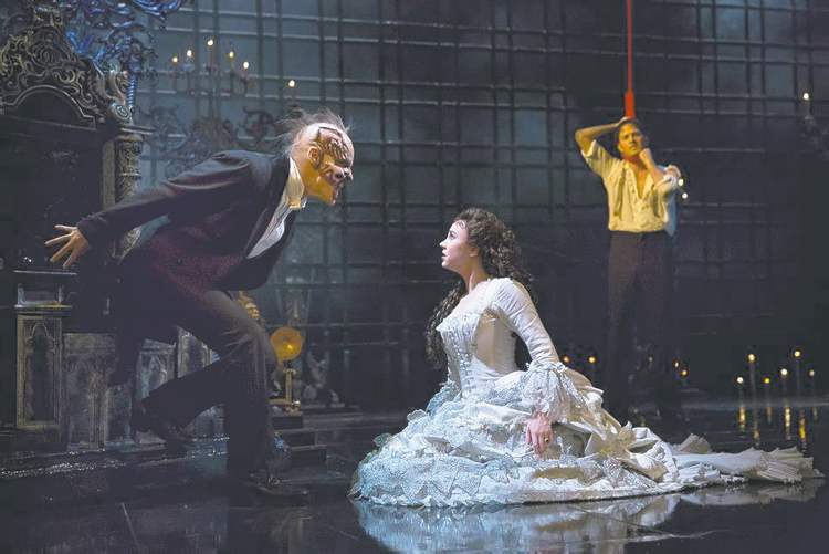 Joan Marcus photo
Hugh Panaro as The Phantom, Samantha Hill as Christine and Kyle Barisich as Raoul at the Majestic Theatre.