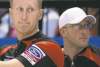 CP
Jonathan Hayward / the canadian pressCanadian skip Brad Jacobs (left) and lead Ryan Harnden watch the action during their team�s afternoon win over Russia at the men�s curling championship.