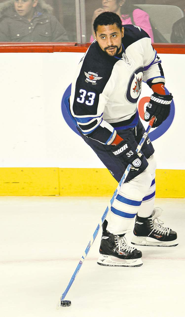 CP
Winnipeg Jets defenseman Dustin Byfuglien (33) warms up before the game against the Montreal Canadiens Thursday, April 4, 2013 in Montreal.THE CANADIAN PRESS/Ryan Remiorz