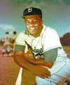 The Associated Press archives
FILE - Brooklyn Dodgers baseball player Jackie Robinson poses in 1952. Kansas City's Negro Leagues Baseball Museum is hosting an advance screening of an upcoming movie about Robinson, who broke major league baseball's color barrier. Thomas Butch of the financial firm Waddell and Reed announced Wednesday, March 20, 2013 that actors Harrison Ford and Andre Holland will be among those appearing at an April 11 screening of 