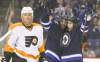 Trevor Hagan / Winnipeg Free Press
Evander Kane (middle) and Alexander Burmistrov celebrate after Kane scored during the second period against the Philadelphia Flyers Saturday. Flyers' Jay Rosehill doesn't look quite as happy.