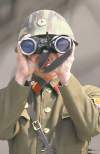 Lee Jong-hoon / The Associated Press
A North Korean soldier uses a pair of binoculars to watch the South Korean side at the border village of Panmunjom in the demilitarized zone (DMZ) in South Korea Thursday, April 4, 2013. South Korea�s defense minister said Thursday North Korea has moved a missile with �considerable range� to its east coast, but said it is not capable of hitting the United States.